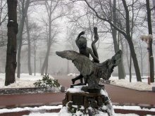 Fog. Sculpture &quot;The boy playing with a swan.&quot; / ***