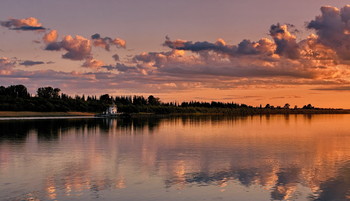 Sunset over a river. / ***
