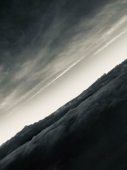 Darkness of Clouds / This is a completely original and unique sky photo taken from an airplane.