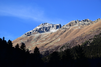 In the mountains. / ***