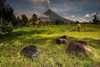 Mayon Volcano / The wrath of nature brings life in exchange. Rich agriculture thrives on the perimeter of Mayon volcano because of minerals deposits it produce.