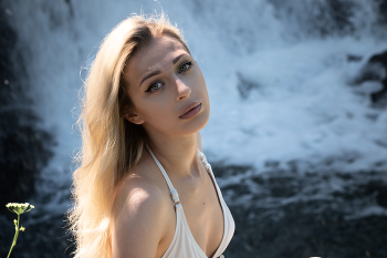 At the waterfall / ***