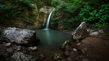 At the waterfall / ***