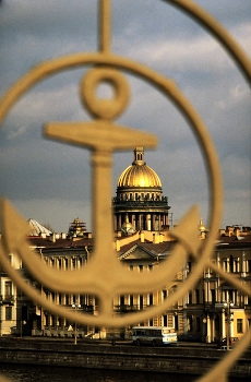 Saint Petersburg / Saint Petersburg is located on the Neva River, at the head of the Gulf of Finland; the easternmost arm of the Baltic.

On a photo walk in Russia's second largest city I chose to frame the golden dome of Saint Isaac's Cathedral within an anchor; to emphasize Saint Petersburg's connection with the sea.

Founded by Peter the Great in 1703, Saint Petersburg became the imperial capital of Russia until 1918. The Baltic port was also known as Petrograd in 1914, then Leningrad in 1924, before reverting back to Saint Petersburg in 1991.

https://travelnotes.org/pics/Europe/14-Saint_Petersburg_Russia.htm