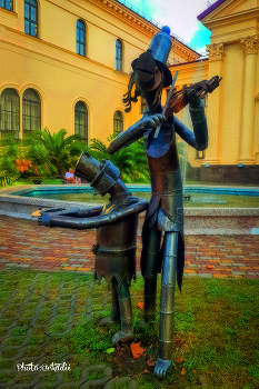 Strolling musicians. / ***