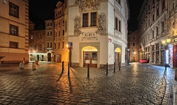 at the intersection of two roads / ***