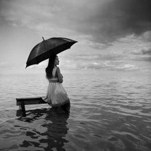 Flood / Downpour on my soul
Splashing in the ocean, Im losing control
Dark sky all around
I cant feel my feet touching the ground
(c) JoC