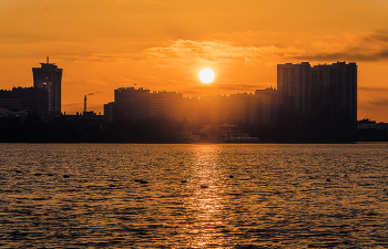 Sunset over the city / ***