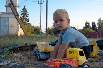 In the village. / ***