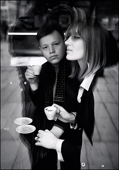 In the coffee shop. / ***