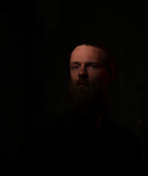 Portrait photographer. / ***