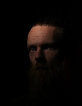 Portrait photographer. / ***