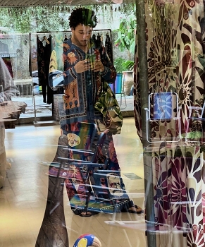 Through the glass / Through the window glass of a closing shop