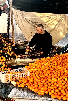 Mandarines / A market stall