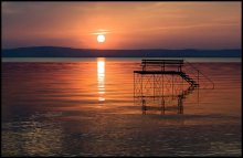 Lonely bench at sunset. / ***