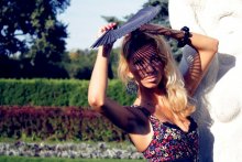 Girl with a Fan / .....
