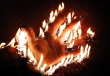 Hand in the fire. / ***