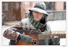 Musician and snowfall / ***