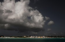 Cloud formation over small town / ***