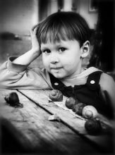 portrait of a boy with snails / ......