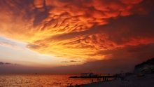 The clouds above the beach / ***