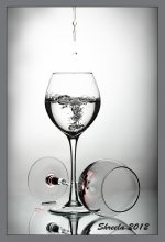 A glass of water / ***