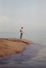 A lone fisherman / ***