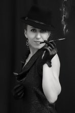 Cigarette smoke / a lady with a cigar
