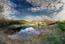 spring morning on the lake in the mountains / ***