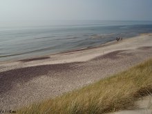 The Curonian Spit horizon merges with the sea. / ***