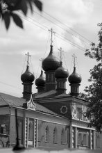 The bell tower and the Holy Cross Church in St. Nicholas Edinoverie Monastery in Moscow. / ***