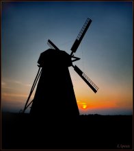 Windmill at sunset / ***
