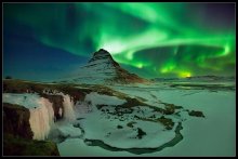 Northern lights over Kirkjufell. / ***