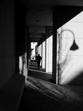 Through / Person, walking, light, shadow, streetlight