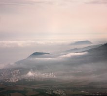 Of clouds over the sea and Alushta / ***