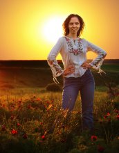 Against the background of the sunset / ***