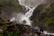 Waterfall and photographer / ***