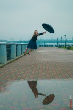 Autumn levitation with an umbrella / ***