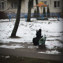 Nun sipping a morning beer in Minsk / ***