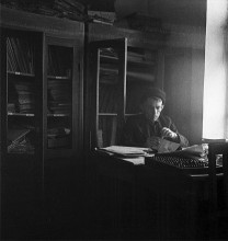 Portrait of an accountant in the interior of the kolkhoz / ***