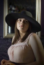 Portrait of girl in hat / ***