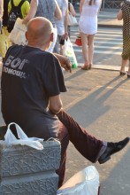 God help you (the inscription on the shirt). Homeless at the ballot box at the store / ***