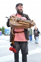 Russian guy with the wheel lyre / ***