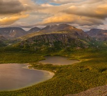 The lakes at the foot of the mountains. / ***