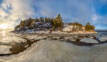Taking a walk on the ice floes around the island. / ***