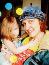 With his mother / ***