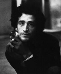 Portrait of a man with a kitten / ***