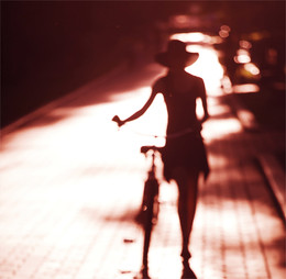 A girl with a bicycle / ***