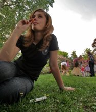 girl sucking lollipop and background. / ***