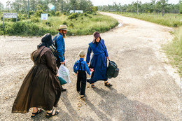 8 miles to Roseville / The members of the Roseville Mennonites colony (Belize) on their 8 mile way back home.